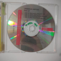 ซีดี Jamaica United Starring Ziggy Marley, Buju Banton, Diana King, Shaggy, Maxi Priest, Ini Kamoze, Toots Hibbert - Rise Up CD VG+