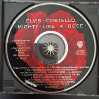 ซีดี Elvis Costello - Mighty Like A Rose CD VG+