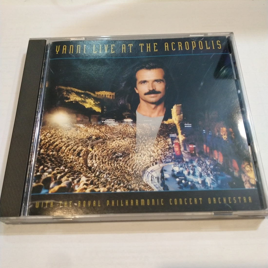 ซีดี Yanni With The Royal Philharmonic Concert Orchestra - Live At The Acropolis (CD) (VG+)