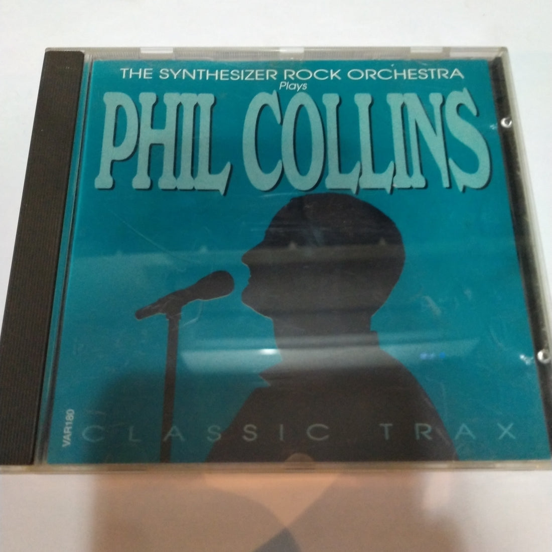 ซีดี The Rockridge Synthesizer Orchestra - The Synthesizer Rock Orchestra Plays Phil Collins Classic Trax (CD) (VG)