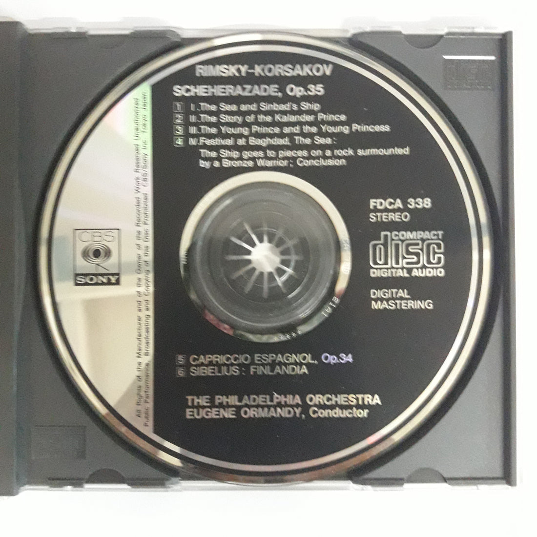 ซีดี Nikolai Rimsky-Korsakov - The Philadelphia Orchestra, Eugene Ormandy - Scheherazade, Op. 35 / Capriccio Espagnol, Op. 34 & Others (CD) (VG+)