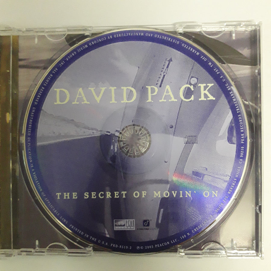 ซีดี David Pack - The Secret Of Movin' On (CD) (NM or M-)