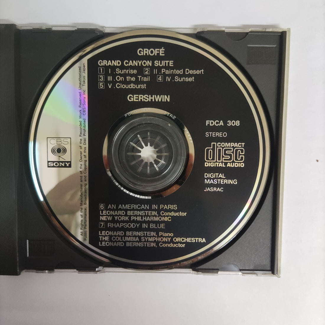 ซีดี Ferde Grofé / George Gershwin - New York Philharmonic, Leonard Bernstein - Grand Canyon Suite / An American In Paris / Rhapsody In Blue (CD) (VG+)