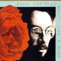 ซีดี Elvis Costello - Mighty Like A Rose CD VG+