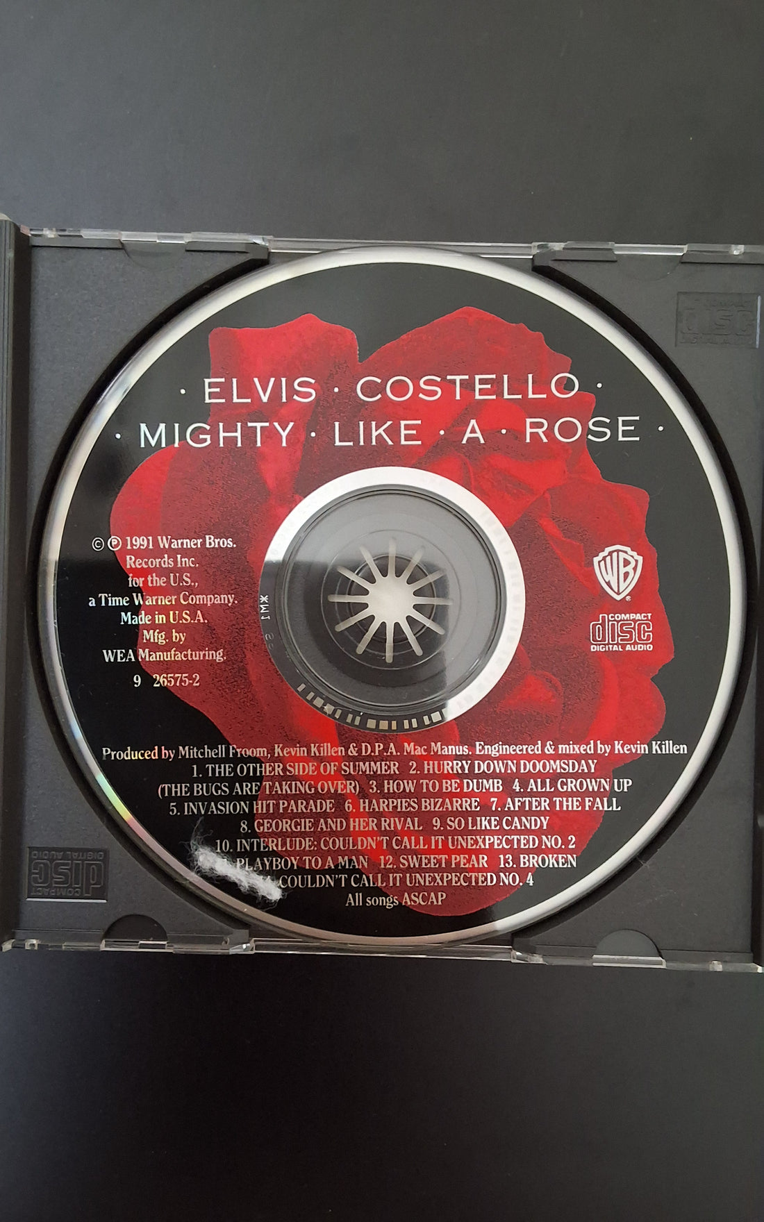 ซีดี Elvis Costello - Mighty Like A Rose CD VG+