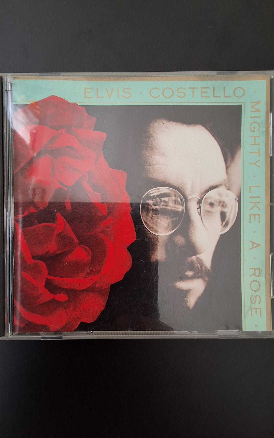 ซีดี Elvis Costello - Mighty Like A Rose CD VG+