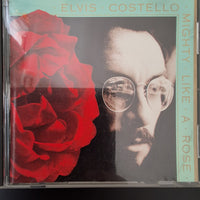 ซีดี Elvis Costello - Mighty Like A Rose CD VG+