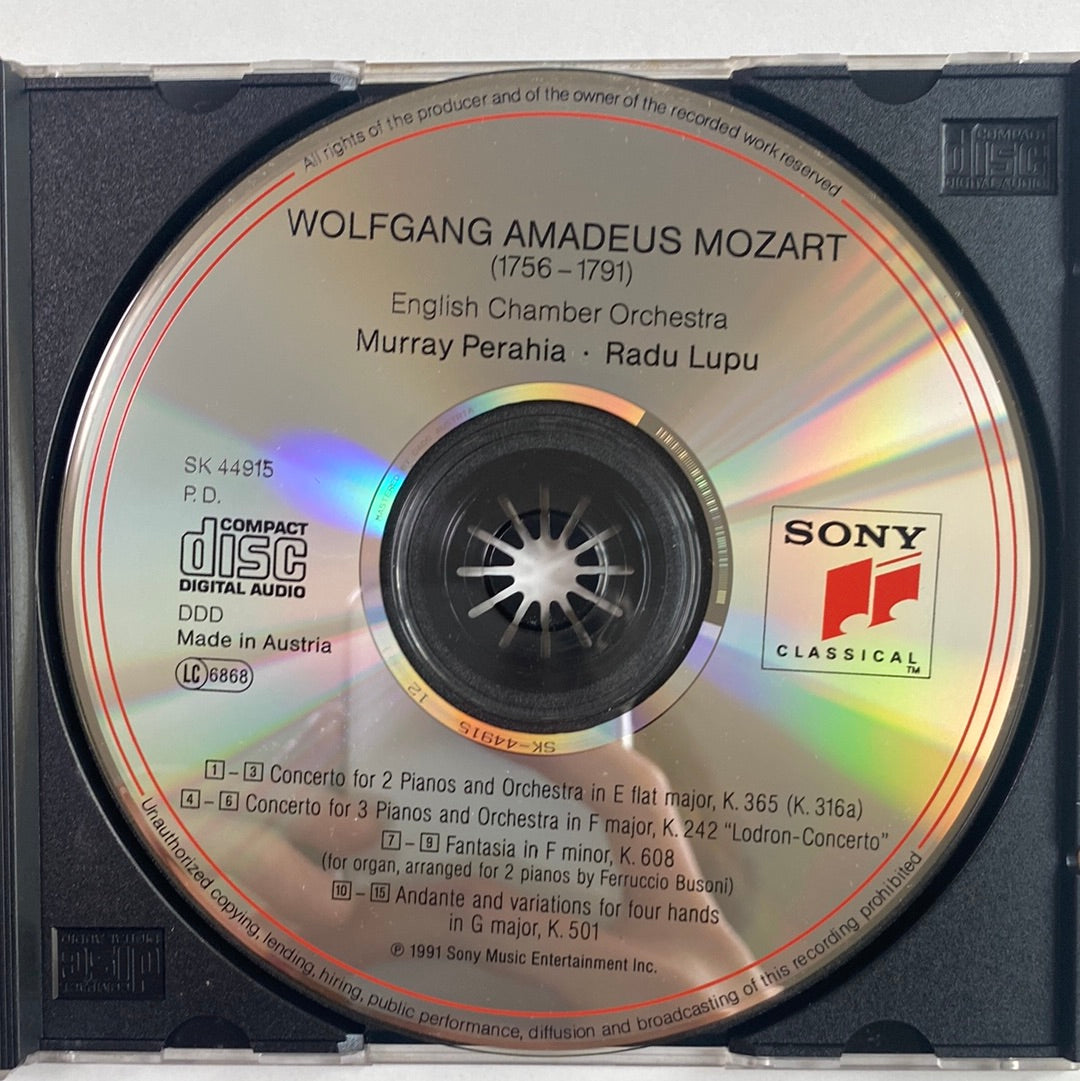 ซีดี Wolfgang Amadeus Mozart / English Chamber Orchestra, Murray Perahia, Radu Lupu - Concertos For Two & Three Pianos - Andante And Variations For Four Hands In C Major, K. 501 - Fantasia In F Minor, K. 608 (CD) (VG+)